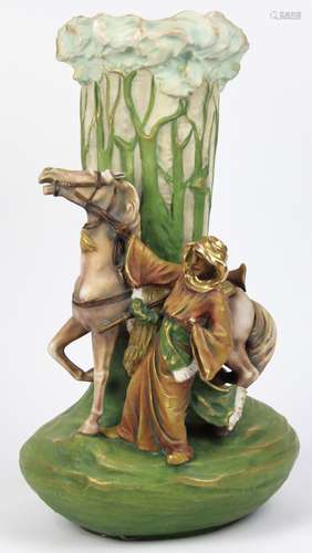 Amphora vase depicting a shepherd and his horse, having a green ground with tree form reserves,