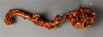 Chinese boxwood ruyi scepter, the head carved with a large persimmon issuing from the scepter in the