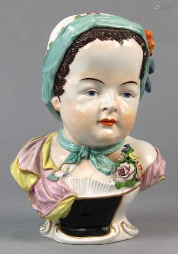 Dresden porcelain figural bust, depicting an infant with hand-painting and applied floral sprays,