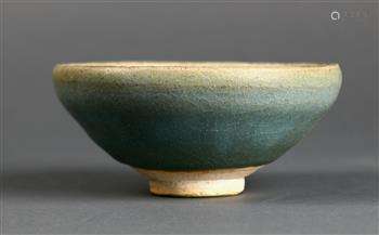 Chinese Jun-type ceramic bowl, with a purple streak on the pale blue glaze, stopping above the