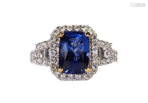 Sapphire, diamond and 18k white gold ring Featuring (1) cushion-cut blue sapphire, weighing 4.35