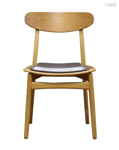 Hans Wegner style side chair, having a shaped back above an upholstered seat, 31