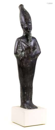 Egyptian style bronze sculpture of the God Osiris, depicted wrapped in a close fitting cloak,