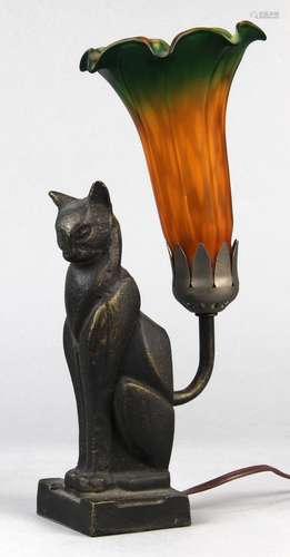 Art Deco style lamp, the base in the form of a seated cat, its tail issuing the glass shade, 12