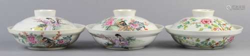 (lot of 3) Chinese lidded shallow porcelain bowls, the first featuring an array of plants