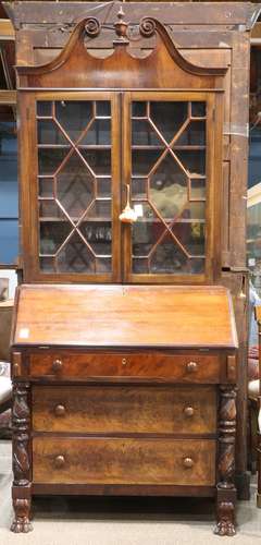 American Classical mahogany secretary, early 19th century, having a broken pediment top, above