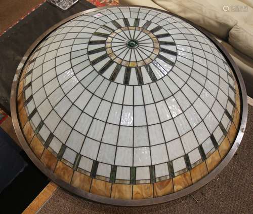 Arts and Crafts style leaded glass pendant lamp, having a dome form with carmel, cream and green