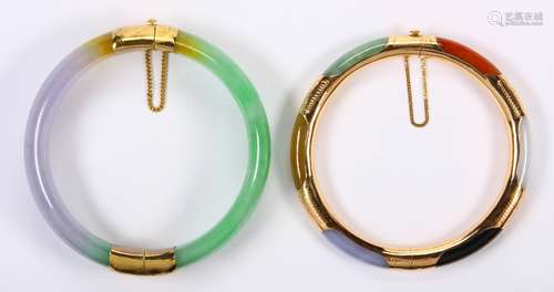 (Lot of 2) Multi-colored jade, 14k yellow gold and metal bangle bracelets Featuring 1) 14 mm wide,