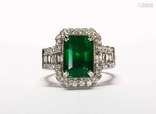 Emerald, diamond and platinum ring Featuring (1) emerald-cut emerald, weighing 5.31 cts.,