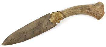 Northwest Coast Inuit knife, having a stone chip carved blade with antler handle, 13.5