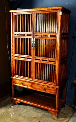 Chinese wooden kitchen cabinet, with railed hinged double doors and side panels, above a row of