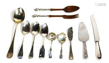 (lot of 11) Assorted silver serving utensils, consisting of (3) coin silver table spoons, (2)