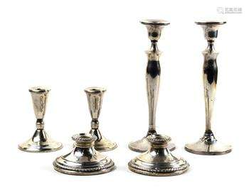 (lot of 6) American sterling silver weighted candle holder group, consisting of (3) pairs of