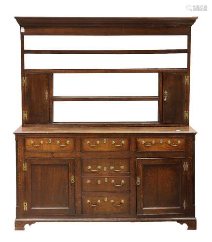 Welsh cupboard circa 1780, executed in oak, having a tiered superstructure above the six drawer case