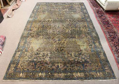 Semi antique Indo Amritsar carpet depicting trees, flowers, and birds, 9'8