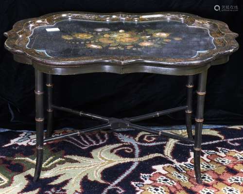 English papier mache tray on stand, the floral decorated top with mother of pearl reserves centering