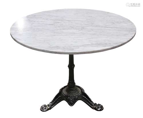 French bistro table, having a carerra marble top above the cast iron gueridon base, 28.5