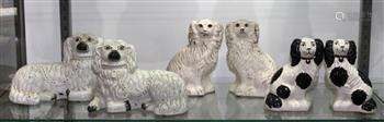 (lot of 6) Staffordshire style pottery figural group, consisting of (3) pairs of spaniels, two