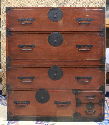 Japanese two-part tansu chest, reddish brown lacquered: upper section with two drawers, lower