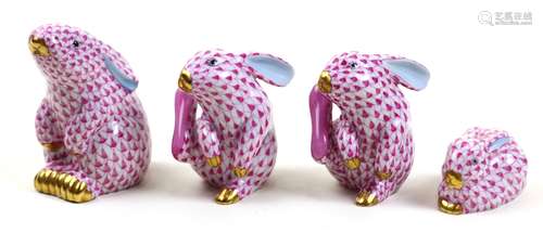 (lot of 4) Herend hand painted porcelain rabbits, each decorated in pink in the Fish Net pattern