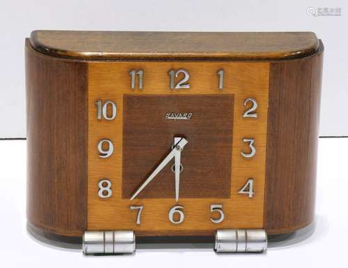 French Art Deco Bayard mantle clock, having a contoured walnut case and rising on brushed tubular