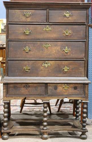 English Georgian chest on stand, having an oak case with early finish and replaced pulls, the top