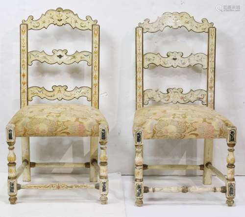 Pair of Continental polychrome decorated chairs, each having a shaped crest with figural decoration,