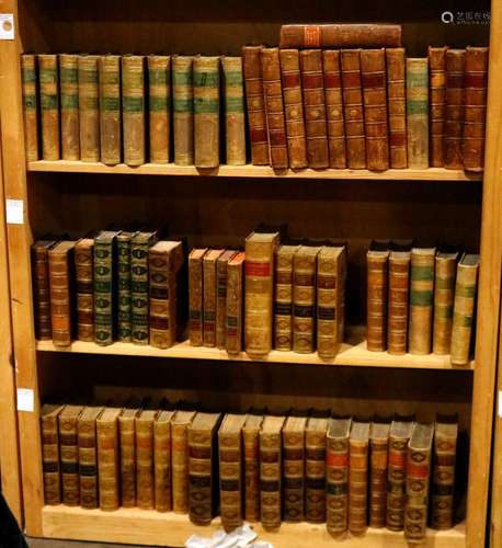 Three shelves of leather bound books mostly relating to literature and history, including an early