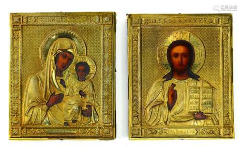 (lot of 2) Russian icon wedding pair, each having a brass oklad, one depicting Christ Pantocrater,