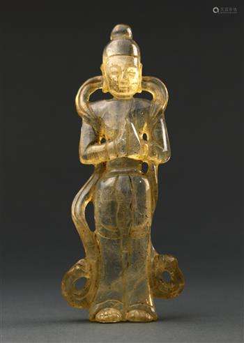 Chinese rock crystal carving, of a standing deity draped in celestial scarf, with hands clasped