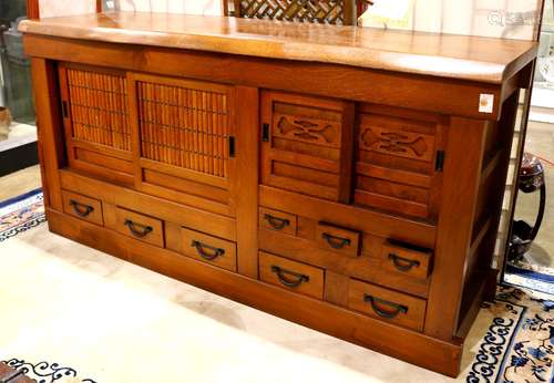 Japanese tansu chest, two sliding door sections, each with an interior shelf, above five drawers