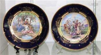 (lot of 2) Royal Vienna porcelain plate group, each plate with a partial gilt and cobalt decorated