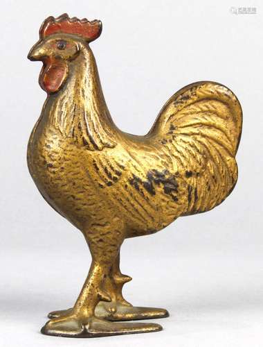 Cast iron rooster penny/still bank, the body executed in gold with a red colored comb, 5