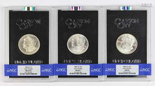 (lot of 3) Morgan silver dollars, 1883(CC) NGC 64, 1882(CC) NGC 63 plus, 1883(CC) NGC 64 PL, all