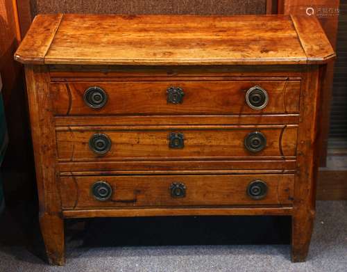 Diminutive continental chest circa 1780, having a rectangular top above three drawers having incised