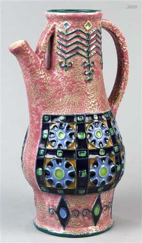 Amphora style glazed ceramic pitcher, having a pink ground with stirrup handles, the baluster form