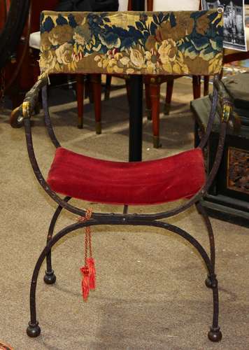 Continental Savonarola style bronze chair, having a tapestry upholsterd back with floral decoration,