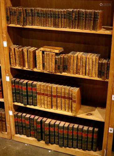 Four shelves of monthly leather bound books, including Bibliotheque Universelle Des Dames, The