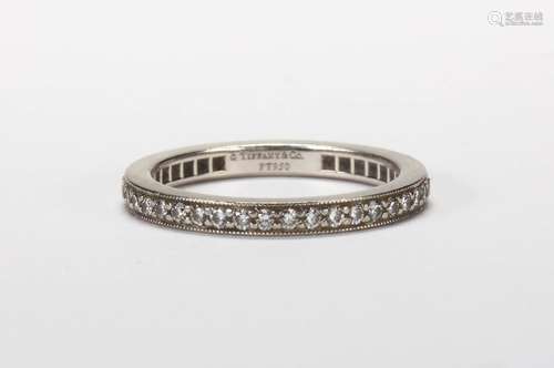 Tiffany & Co. diamond and platinum eternity band Featuring (40) full-cut diamonds, weighing a