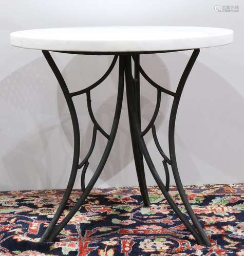 Italian occasional table, circa 1960, having a circular marble top, above the patinated metal