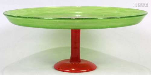 Schneider glass compote, having a dish top executed in lime green, above the mottled orange base,