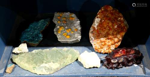 (lot of 7) Assorted geode and crystal specimens, the largest having an amber color, 12