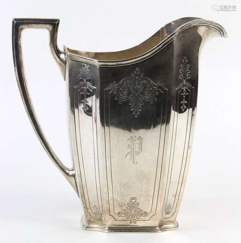 Reed & Barton sterling silver water pitcher, decorated with foliate motifs framing the 