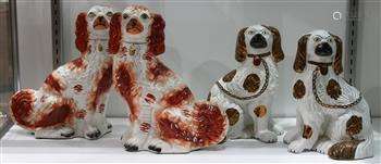 (lot of 4) Staffordshire and Staffordshire style pottery figural group, comprising (2) pairs of