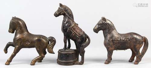 (lot of 3) Cast iron still horse banks, consisting of one prancing, one standing on all four legs;