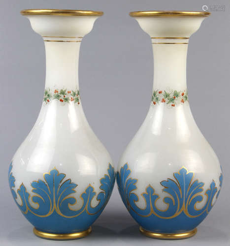 Pair of Bohemian glass vases, early 20th Century, the milk glass vase with polychrome and gilt