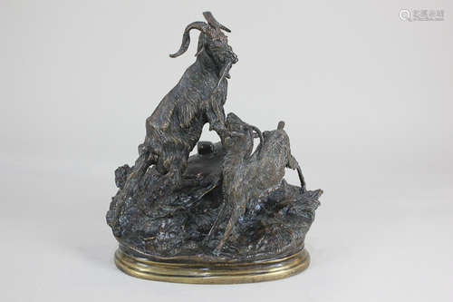 After Jules Moigniez (French 1835-1894), a bronze figure group of two goats, the male standing on