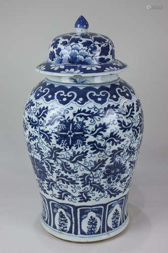 A Chinese blue and white porcelain ginger jar and cover of baluster form, decorated with flowers,