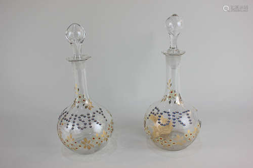 A pair of 19th century Austrian glass spirit decanters of globular form, the floral design marked