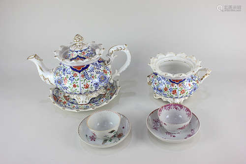 A 19th century Staffordshire porcelain teapot with matching sucre (missing lid) and teapot stand,